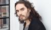 Russell Brand draws support from controversial model amid sex abuse claims