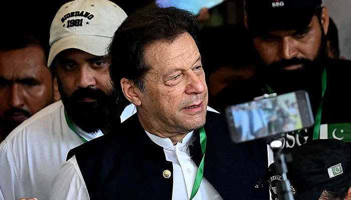 PTI Chairman Imran Khan leaves after appearing in the Supreme Court in Islamabad on July 26, 2023. — AFP