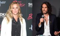 Amy Schumer calls out Russell Brand’s success amid sexual assault claims