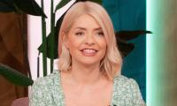 Holly Willoughby dress today: TV star poses in floral ahead of 'This Morning' gig