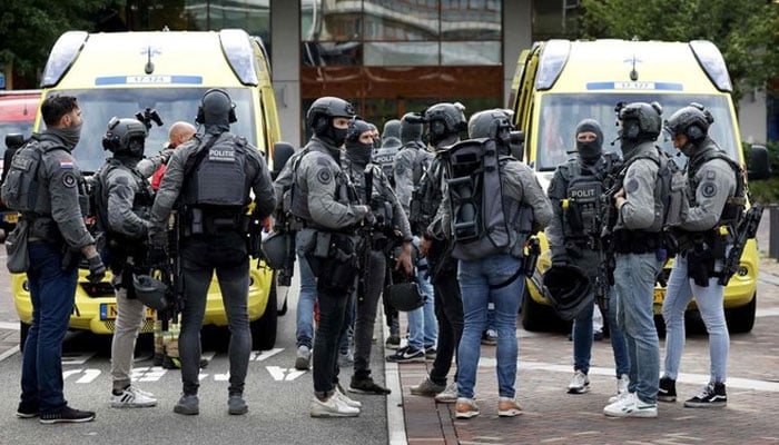 Netherlands’ special intervention police officers gather at the Erasmus University Medical Center (Erasmus MC) in Rotterdam on Sept. 28, 2023, which was cordoned off after two reported shooting incidents. (AFP)