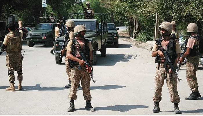 Pakistan Army soldiers stand guard in North Waziristan. — AFP/File