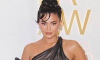 Kylie Jenner Amps Up Paris Fashion Week In Figure Hugging Dress