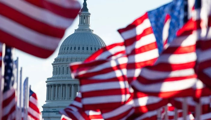 US flags hoisted outside the National Mall in Washington, DC. — AFP