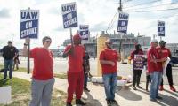 US auto strike grows as 7,000 more workers join forces 