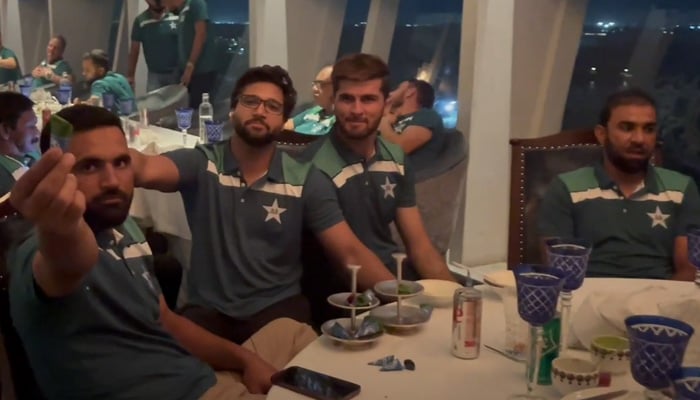 Fakhar Zaman (left), Imam-ul-Haq, Shaheen Afridi and Iftikhar Ahmed are seen seated on a table at a restaurant in Hyderabad, India, on September 30, 2023, in this still taken from a video. — Twitter/@TheRealPCB