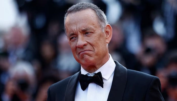 Hollywood actor Tom Hanks gestures during a red carpet event in this file photo. He has starred in blockbusters like Forrest Gump, A Man Called Otto, Da Vinci Code, Cast Away, The Terminal, and more. — Social media @grosbygroup