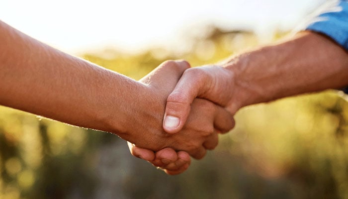 A representational image showing two people shaking hands. — X@capecodhealth