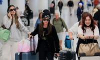 Kyle Richards lands at LAX with friend and daughter amid divorce from Mauricio Umansky