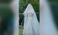 Which designer did Mahira Khan choose for her dreamy wedding dress?