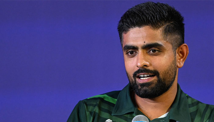 Pakistan skipper Babar Azam speaks during the Captains Day event, an interaction session with the media at the Narendra Modi Stadium in Ahmedabad, India, on October 4, 2023. — AFP