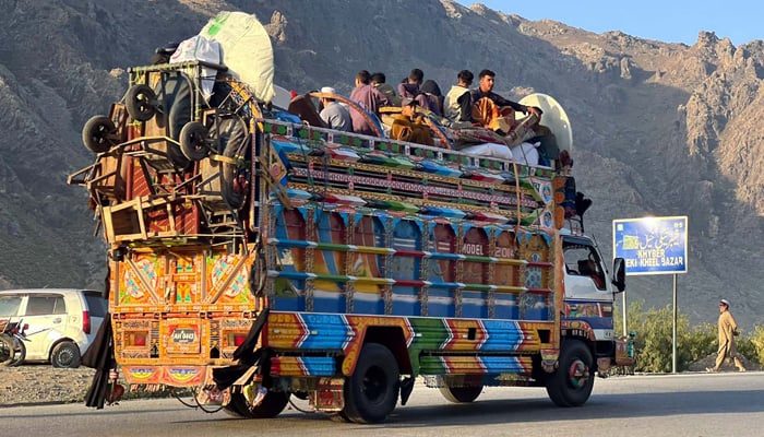 Unregistered Afghan families enroute their homeland passing through the Khyber Pass via Landikotal on Friday, October 6, 2023. — PPI