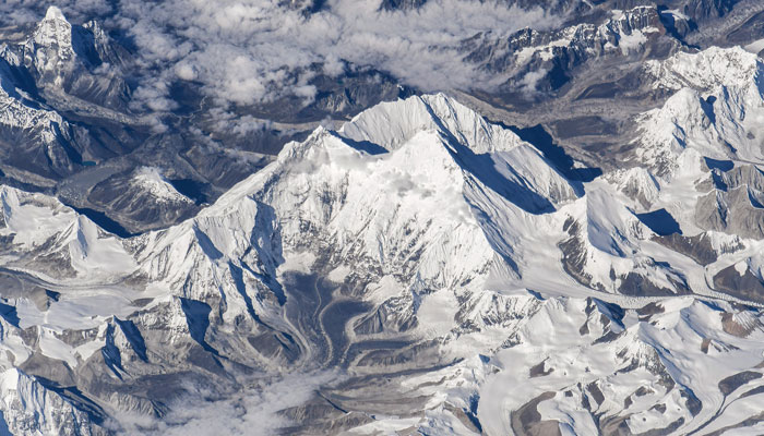This picture shows an aerial view of Mount Shishapangma, in south-central Tibet, five kilometres from the border with Nepal. — X/@OlegMKS