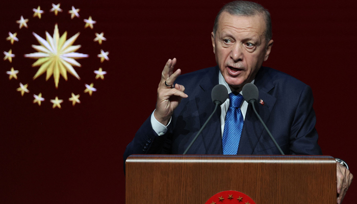 ترک صدر رجب طیب اردوان 9 اکتوبر 2023 کو انقرہ میں بیسٹیپ پیپلز کانگریس اینڈ کلچر سینٹر میں تعلیمی سال 2023-2024 کی افتتاحی تقریب کے دوران تقریر کر رہے ہیں۔ - AFP