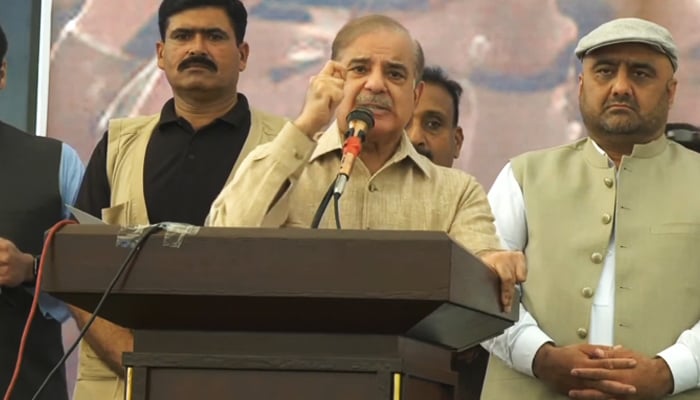PML-N President Shehbaz Sharif addressing traders in Lahore, on October 12, 2023, in this still taken from a video. — YouTube/GeoNews