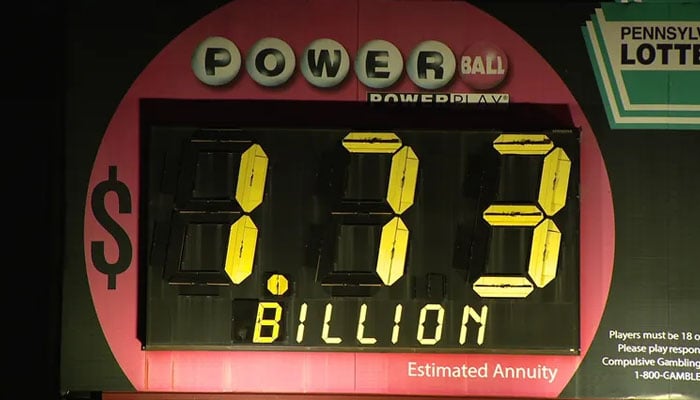 Powerball jackpot results show the jackpot amount on a poster. — Powerball