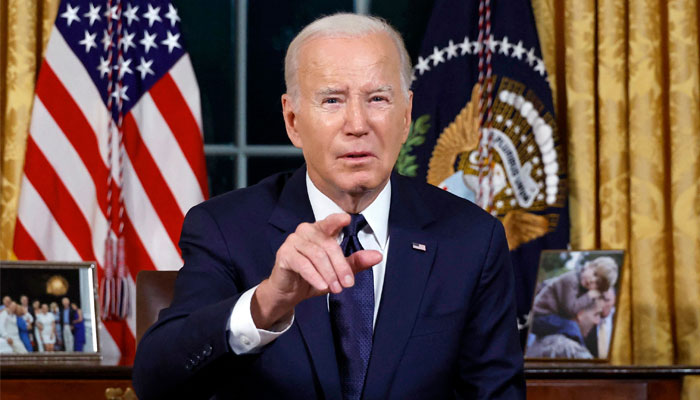 US President Joe Biden addresses the nation on the conflict between Israel and Gaza and the Russian invasion of Ukraine from the Oval Office of the White House in Washington, DC, on October 19, 2023. — AFP