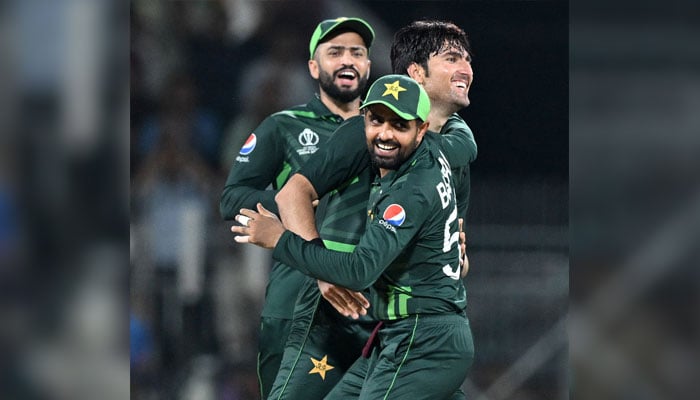 Pakistan´s Mohammad Wasim (R) celebrates with captain Babar Azam (centre) after taking the wicket of South Africa´s Heinrich Klaasen during the World Cup match between Pakistan and South Africa at the MA Chidambaram Stadium in Chennai on October 27, 2023. — AFP