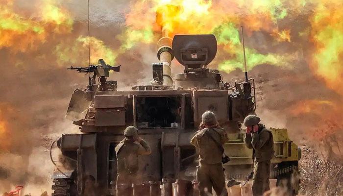 Israeli forces fire a self-propelled artillery at Hamas positions in Gaza Strip on Oct 2023. — AFP