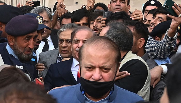 Former prime minister and graft convict Nawaz Sharif leaves after appearing before the High Court in Islamabad on October 24, 2023. — AFP