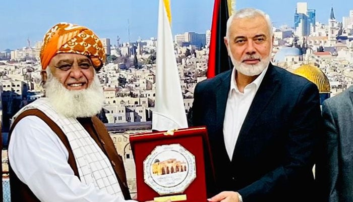 JUI-F chief Maulana Fazlur Rehman (left) and Hamass Qatar-based leader Ismail Haniyeh during their meeting in Qatar on November 5, 2023. — X/@MoulanaOfficial