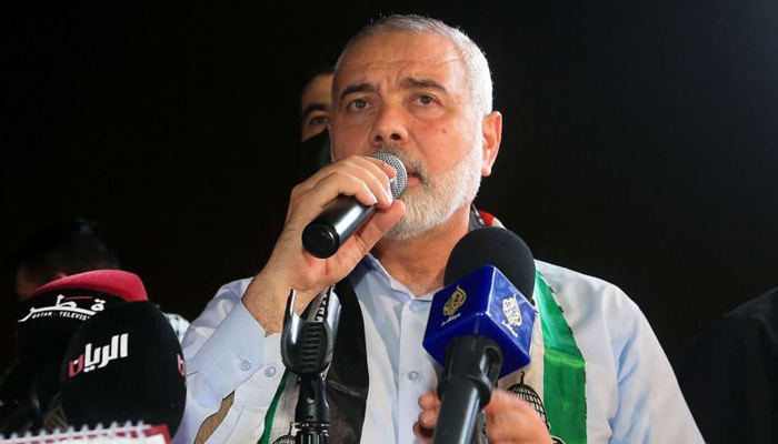 Hamas chief Ismail Haniyeh addressing supporters in Doha in this undated image. — AFP