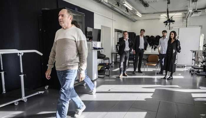 Marc, who has advanced Parkinsons disease, walks with help from electrodes implanted in his spine at Lausanne University Hospital in Switzerland. — Lausanne University Hospital