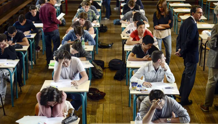 Students in an examination hall of a US school. — AFP/File