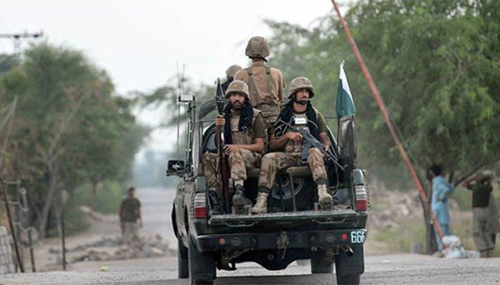 Army personnel in a military vehicle. — AFP/File