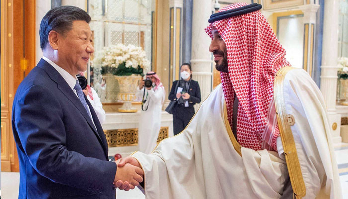 Saudi Crown Prince Mohammed bin Salman shakes hands with Chinese leader Xi Jinping during the China-Arab Summit in the Saudi capital Riyadh on Friday. — AFP