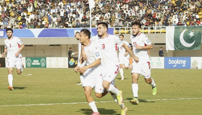 Tajikistan players celebrate during the World Cup 2023 qualifiers match against Pakistan on November 21, 2023. — AFC