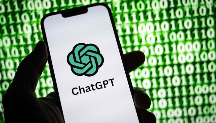 This illustration photograph taken on October 30, 2023, shows the logo of ChatGPT on a smartphone in Mulhouse, eastern France. — AFP