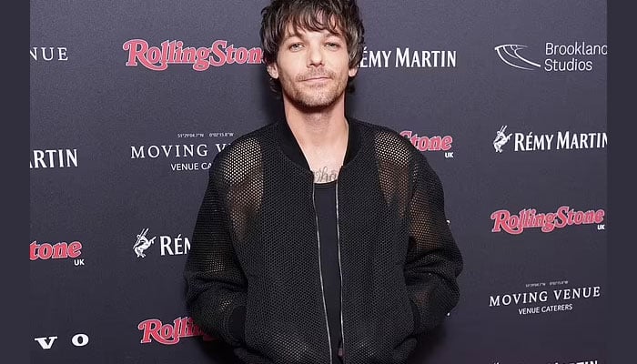 Louis Tomlinson shows off tattoos in crochet bomber jacket at Rolling Stone  Awards