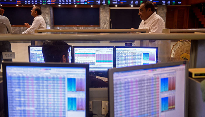 A stock broker looks at a computer during a trading session at the Pakistan Stock Exchange (PSX) in Karachi on July 31, 2023. — AFP
