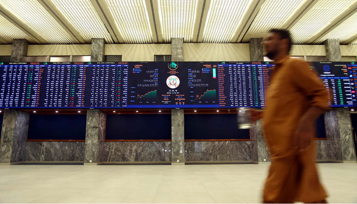 Brokers are busy in trading at Pakistan Stock Exchange (PSX) in Karachi on Monday, November 6, 2023. — AFP