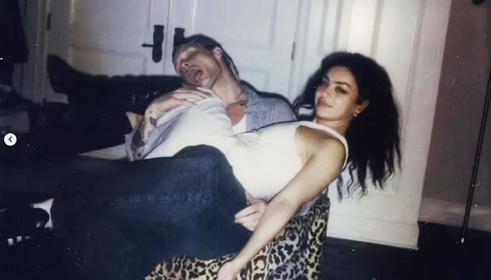 Charli XCX and George Daniel take their relationship to the next stage.