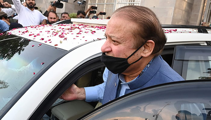 Former prime minister and graft convict Nawaz Sharif leaves after appearing before the High Court in Islamabad on October 24, 2023. — AFP