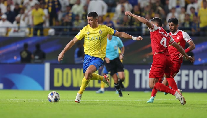 Football star Cristiano Ronaldo playing a football for Al Nassr club in this undated image. — X/@Cristiano