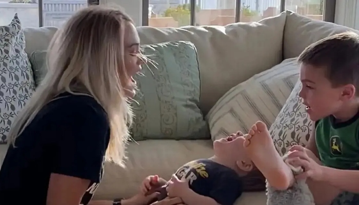 Carrie Underwood shares rare clips of kids with Christmas tree