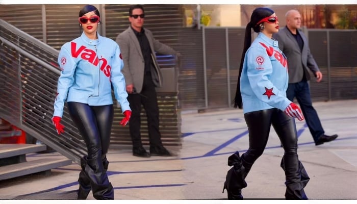 Cardi B added a pop of colour with red sunglasses and matching gloves