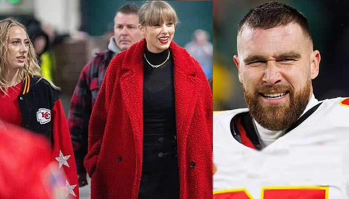 Taylor Swift dazzled in a red overcoat and black dress