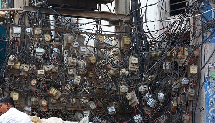 Electricity meters under a transformer in Faisalabad, on September 2023. — APP