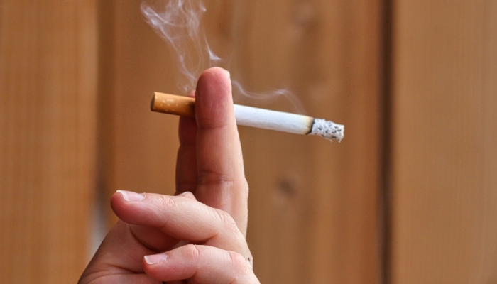 Representational image of a person smoking. — Canva