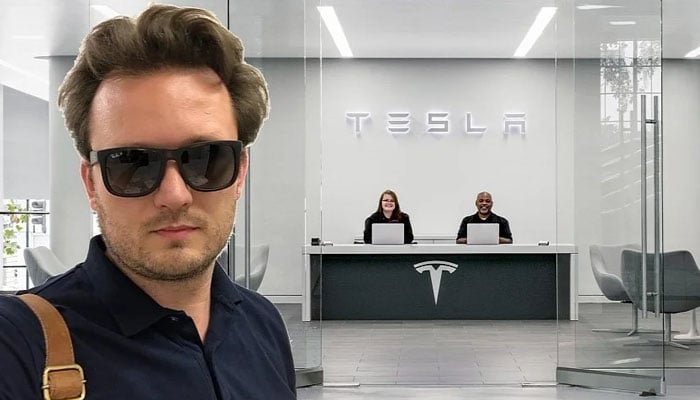 Lukasz Krupski at a Tesla office. — Tesla