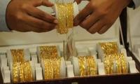 Gold Surges To Record Highs Before Pulling Back