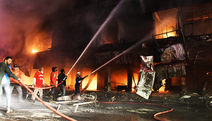 Ayesha Manzil furniture market fire kills three as rescue officials fear building collapse