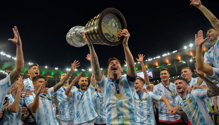 Argentinas Lionel Messi lifts the Copa America trophy as he celebrates with teammates after winning the final against Brazil at Maracana Stadium in Rio de Janeiro, Brazil, July 10, 2021. — AFP
