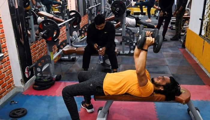 In this picture taken on March 19, a patron exercises in a gym in New Delhi. — AFP/File