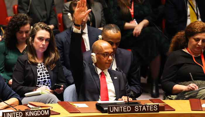 US Ambassador Alternate Representative of the US for Special Political Affairs in the United Nations Robert A. Wood raises his hand during a United Nations Security Council meeting on Gaza, at UN headquarters in New York City on December 8, 2023. —AFP