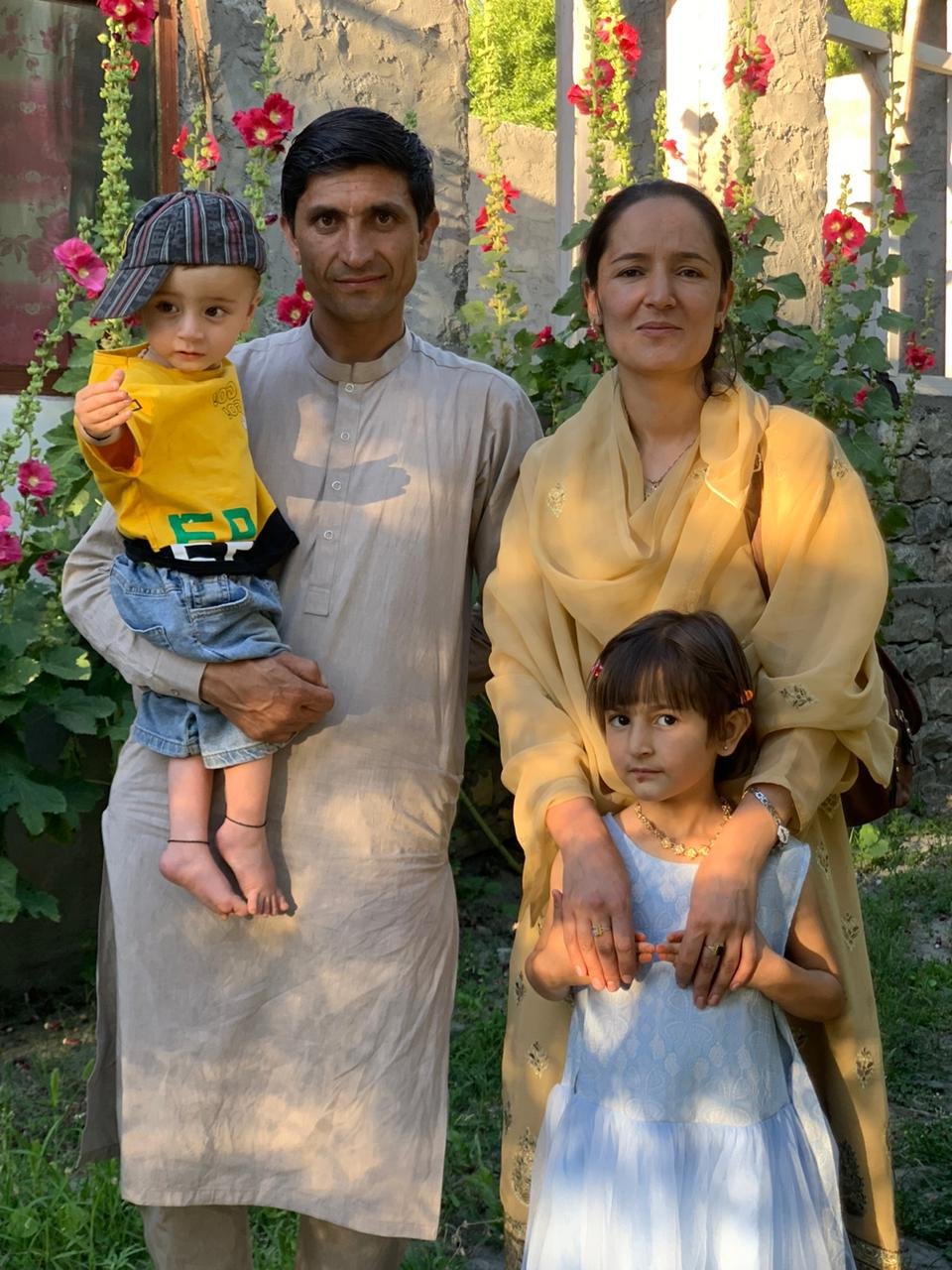 Bulbul Shah (left) Bibi Roshan (right), Arsalan, in his fathers arms, and Umaima. — Bulbul Shah